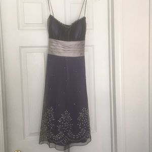 Cocktail dress w/sweetheart neckline & silver sash